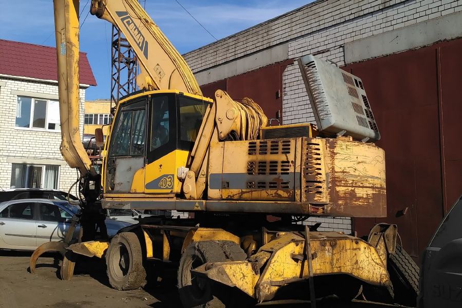 Погрузчик с грейфером для металлолома СOLMAR 403